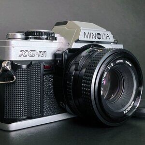 Minolta XG-M 35mm Film SLR Camera w/ Minolta MD 50mm f:2 Lens _ Excellent!